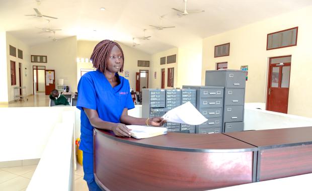 The reception desk, with the patient records behind