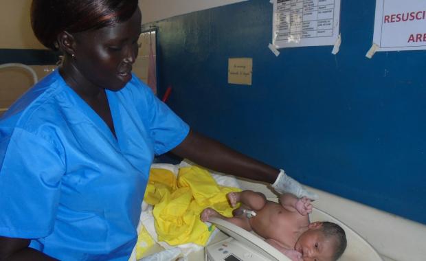 Weighing a newborn